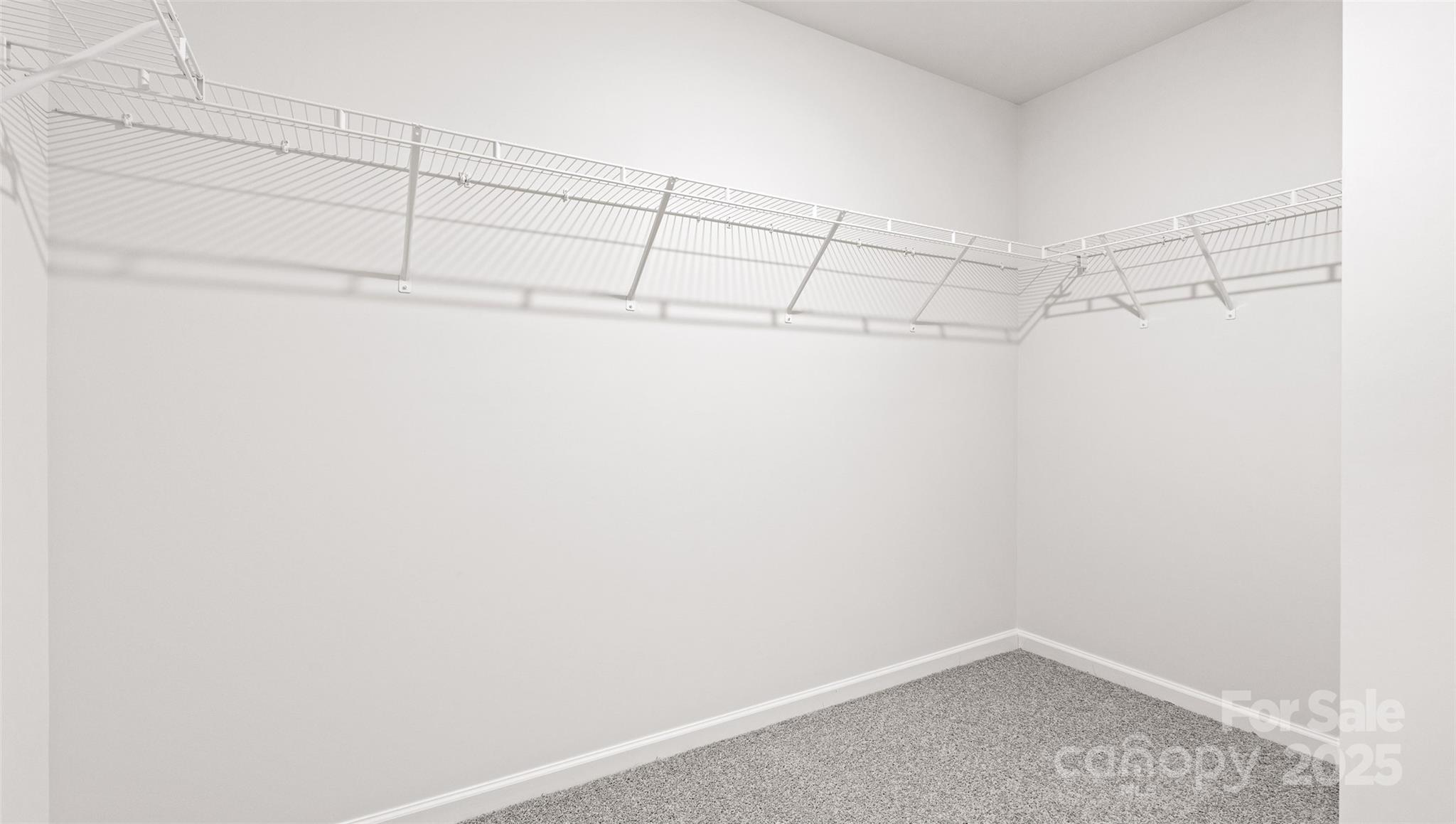 198 Shorthorn Road Fletcher, NC 28732 - Photo 16 of 20 a view of a room with racks on the wall