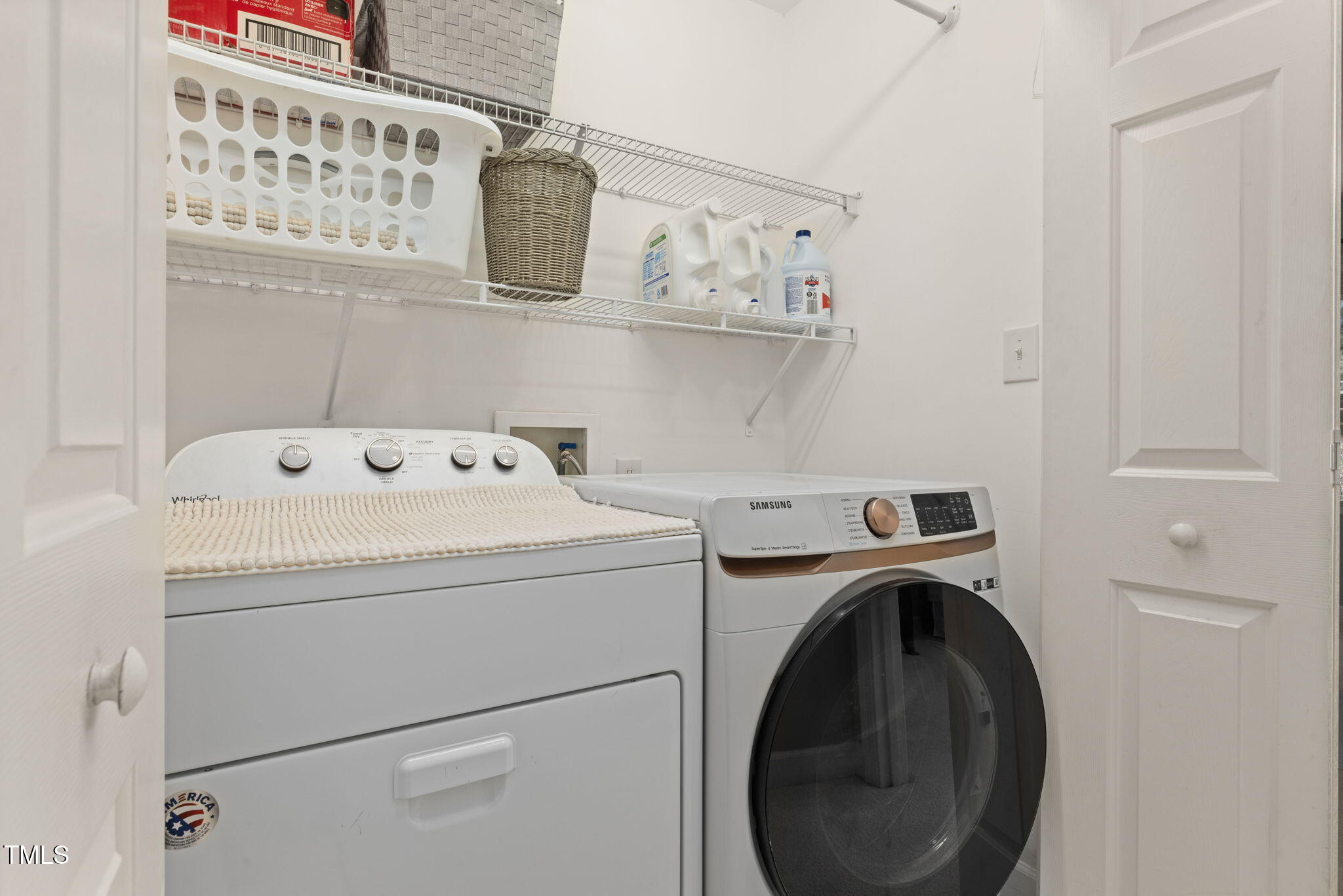 5569 Sea Daisy Drive Raleigh, NC 27606 - Photo 19 of 31 a utility room with dryer and washer
