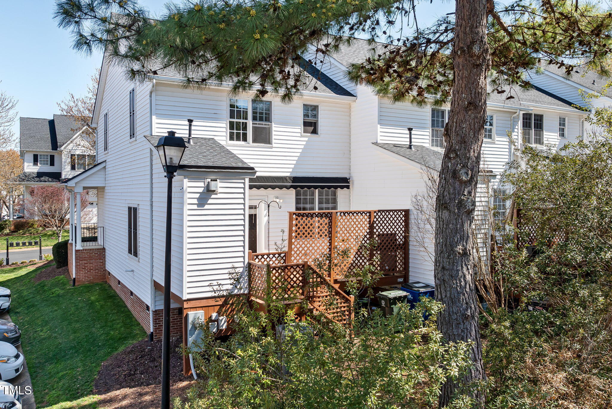 5569 Sea Daisy Drive Raleigh, NC 27606 - Photo 24 of 31 a front view of a house with garden