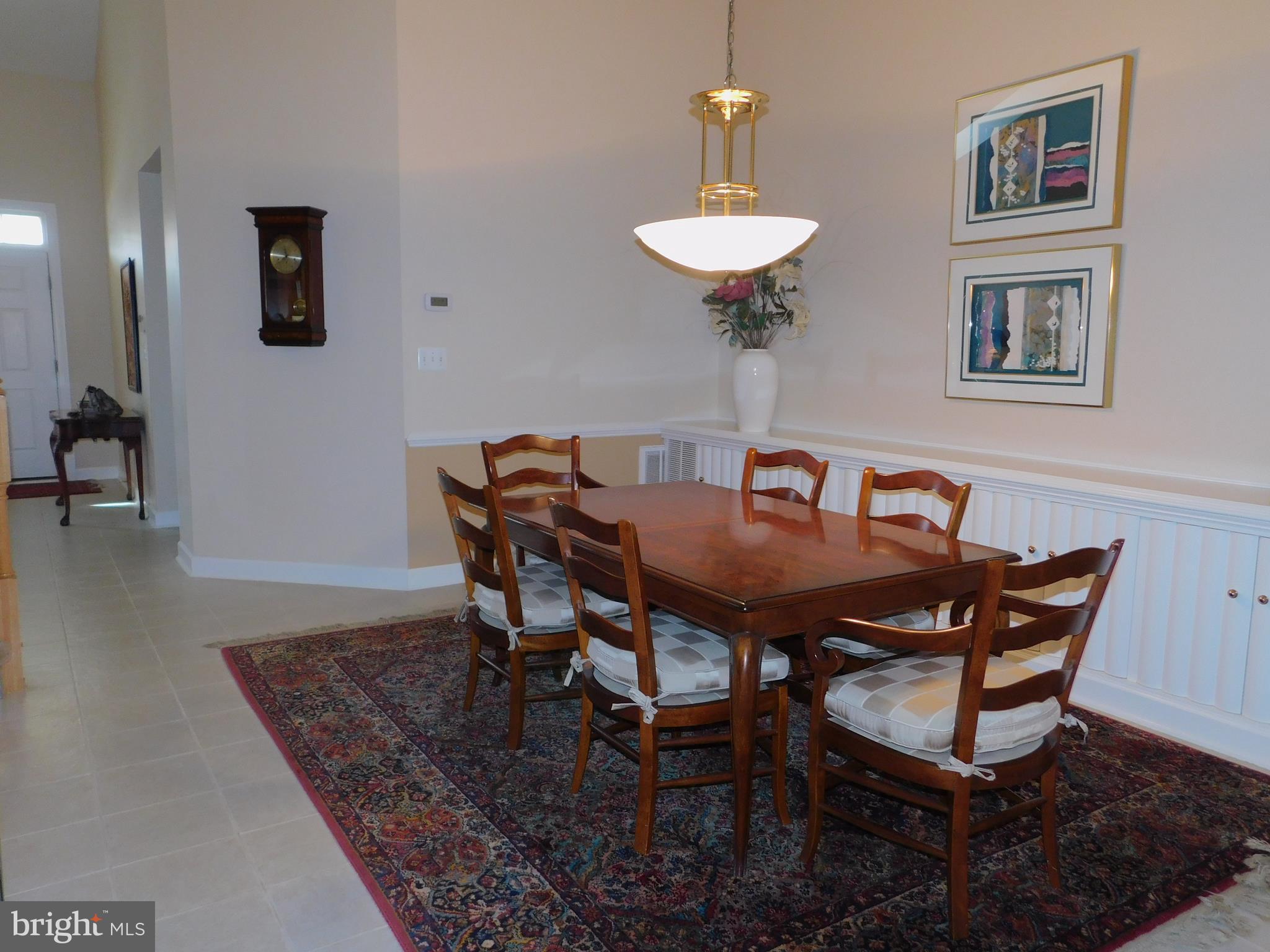 309 Colony Point Place Edgewater, MD 21037 - Photo 3 of 17 Dining offers vaulted ceiling & wall of built-ins