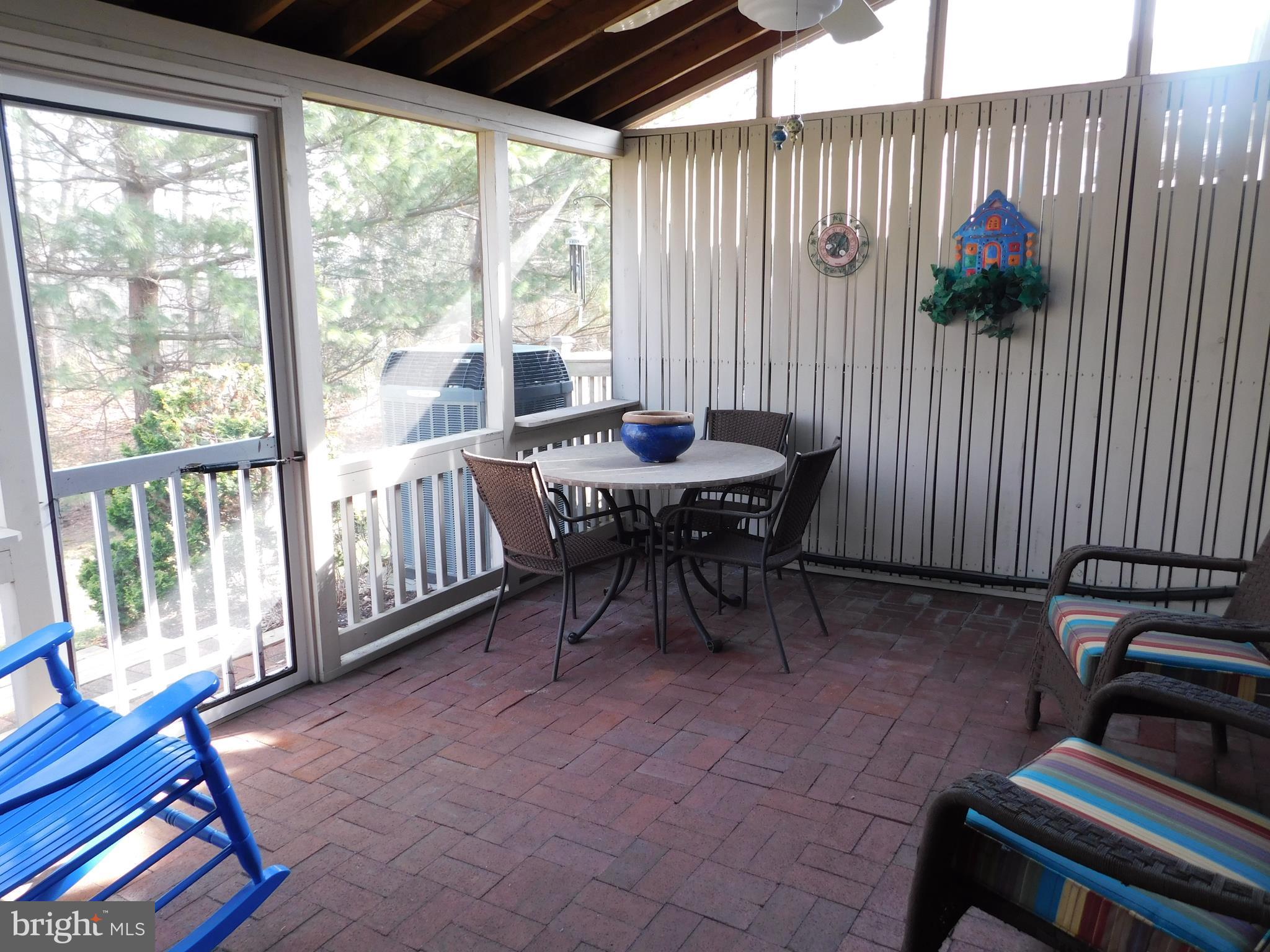 309 Colony Point Place Edgewater, MD 21037 - Photo 7 of 17 Wonderful screened porch, with door to rear yard