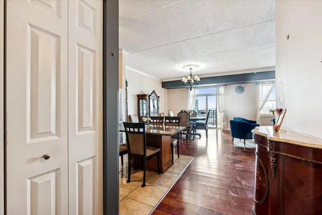 a view of a living room and dining room