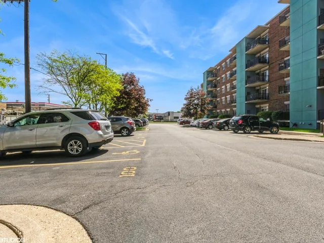 a view of a cars parked in front of a building
