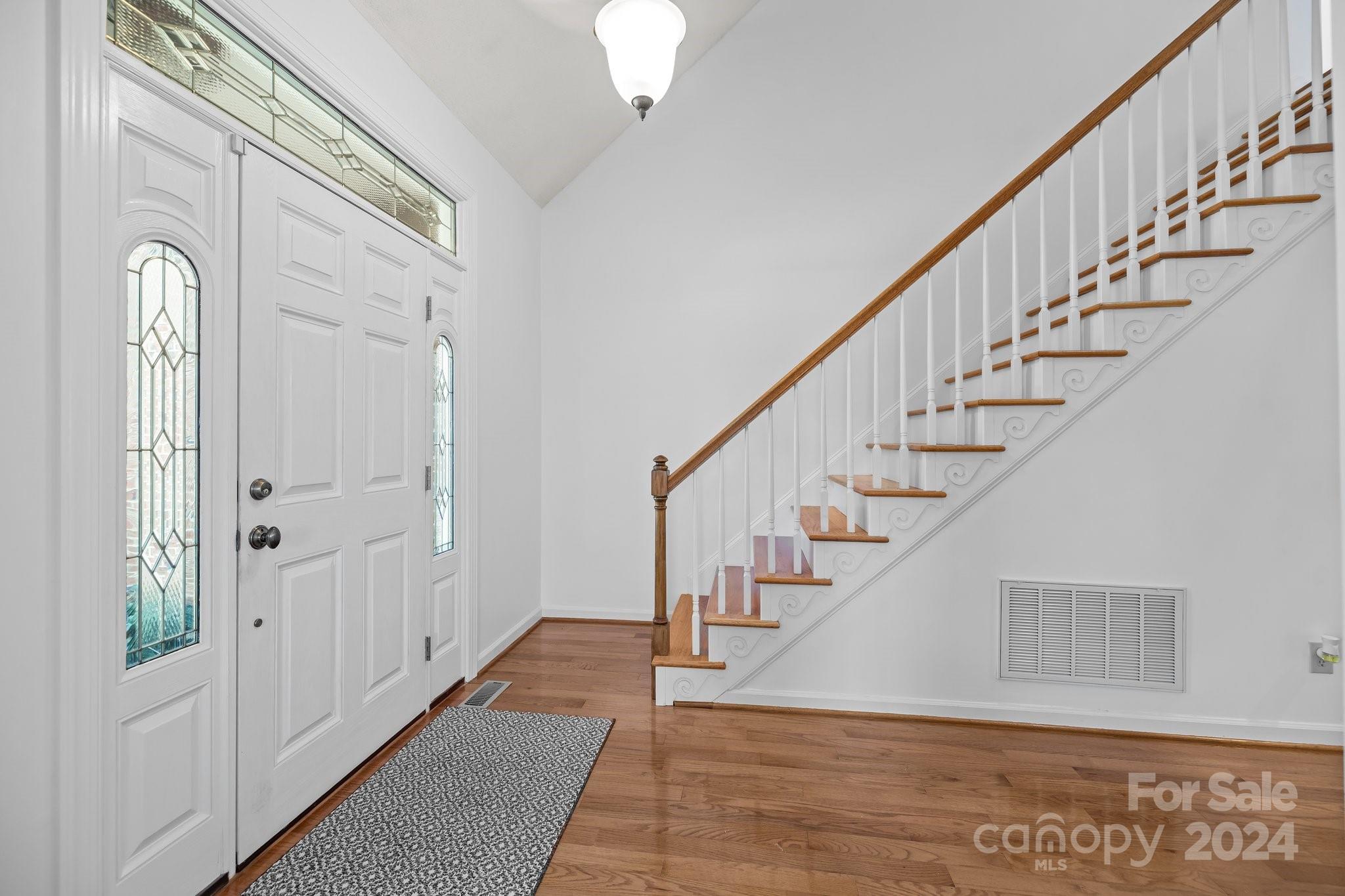 10508 Misty Ridge Lane Charlotte, NC 28277 - Photo 3 of 32 a view of entryway with wooden floor