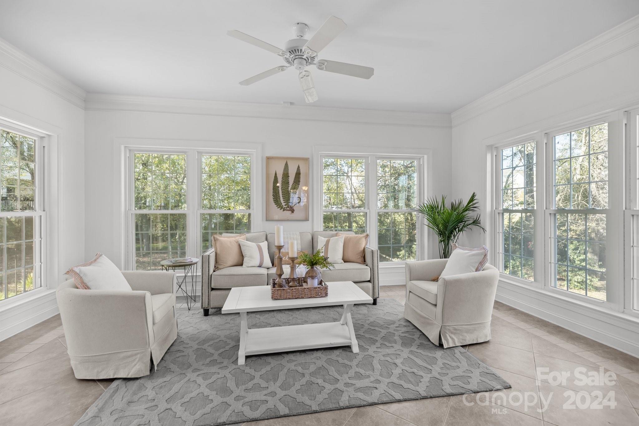 10508 Misty Ridge Lane Charlotte, NC 28277 - Photo 9 of 32 a living room with furniture and a large window