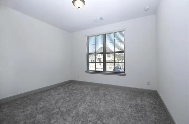 an empty room with closet