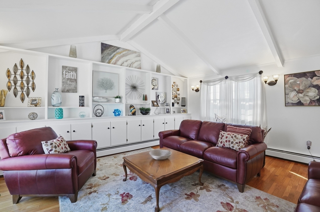 54 Sagamore Road Seekonk, MA 02771 - Photo 15 of 35 a living room with furniture and a couch