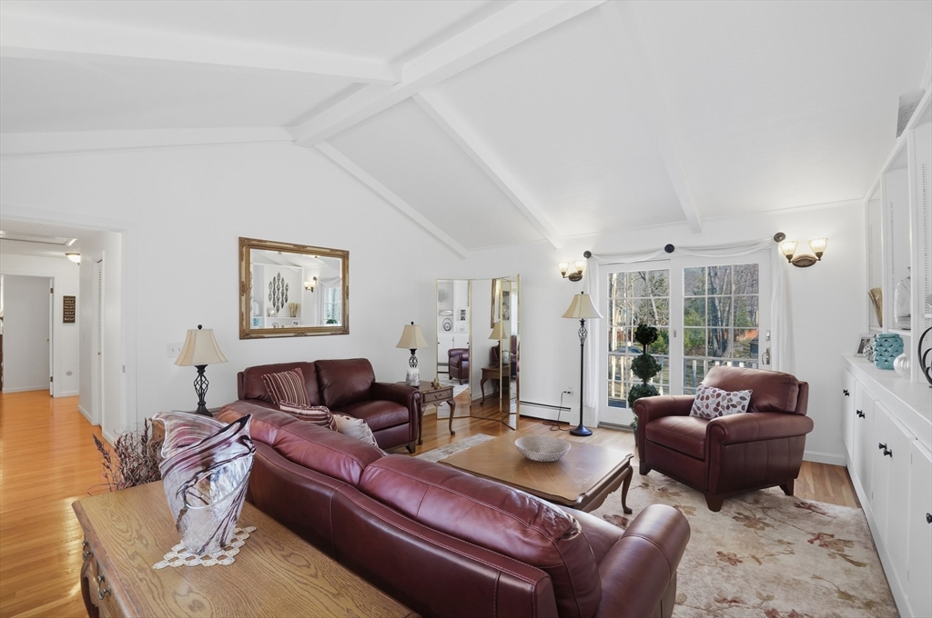 54 Sagamore Road Seekonk, MA 02771 - Photo 16 of 35 a living room with furniture or couch and a large window
