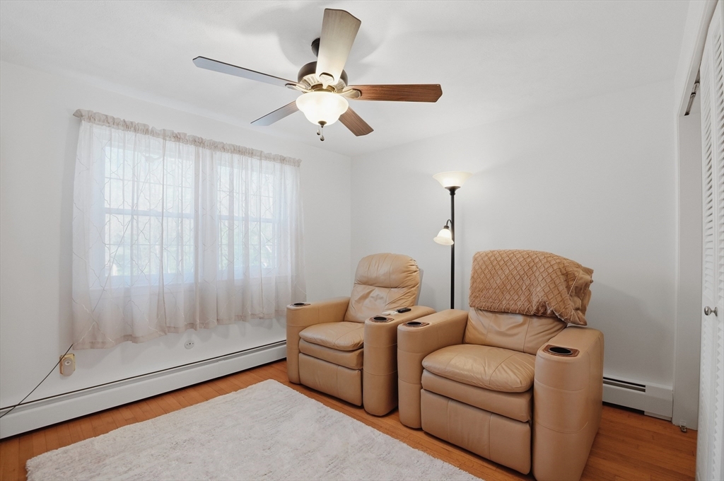 54 Sagamore Road Seekonk, MA 02771 - Photo 17 of 35 a living room with furniture and a window