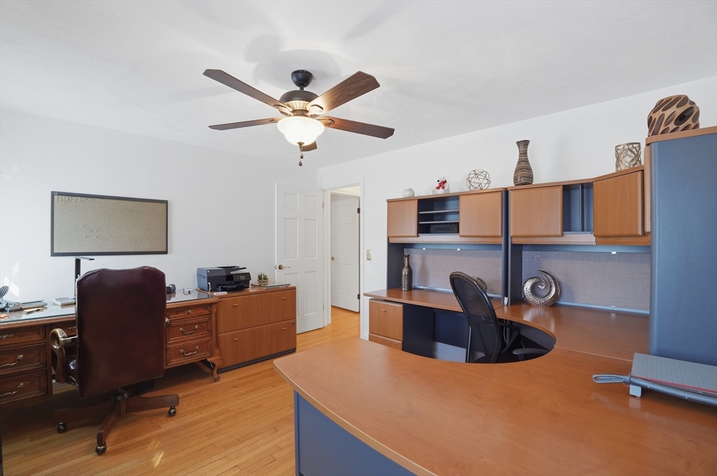 54 Sagamore Road Seekonk, MA 02771 - Photo 20 of 35 a living room with furniture and a flat screen tv