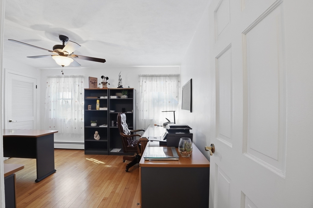 54 Sagamore Road Seekonk, MA 02771 - Photo 21 of 35 a view of a workspace with furniture and a window