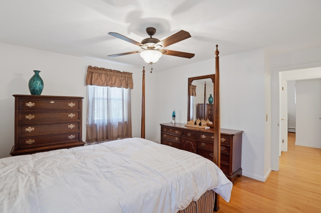 54 Sagamore Road Seekonk, MA 02771 - Photo 26 of 35 a bedroom with a bed and a dresser