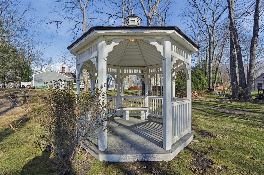 54 Sagamore Road Seekonk, MA 02771 - Photo 33 of 35 a front view of a house with a garden