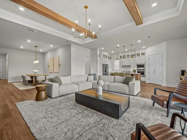 a living room with furniture and a table