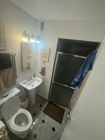 a bathroom with a sink and mirror