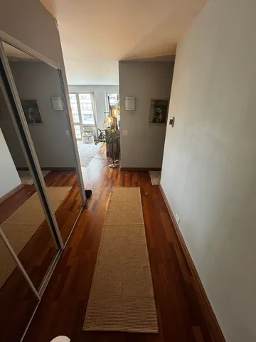 a picture of a bench in front of a door