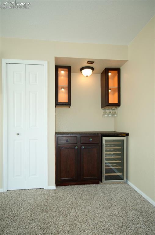 3216 Capstan Way Colorado Springs, CO 80906 - Photo 13 of 45 a view of an empty room with cabinet and mirror