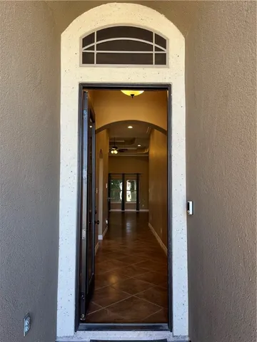 a view of living room with wooden floor
