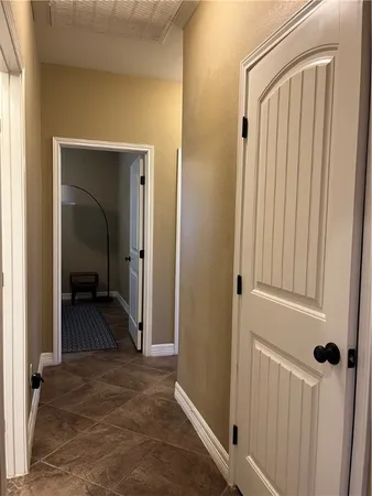 a view of a livingroom from a hallway