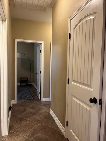 a view of a livingroom from a hallway