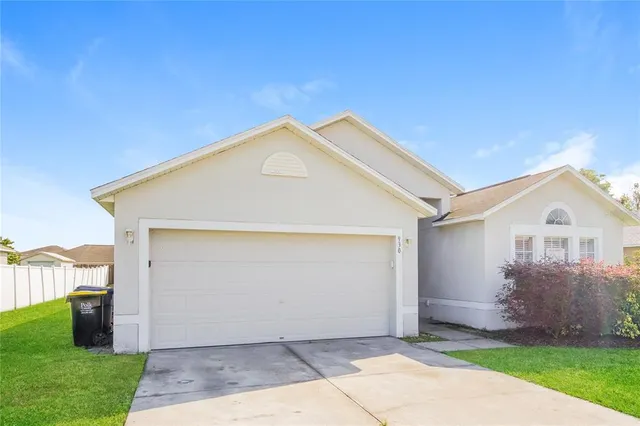 a view of front of house with a yard