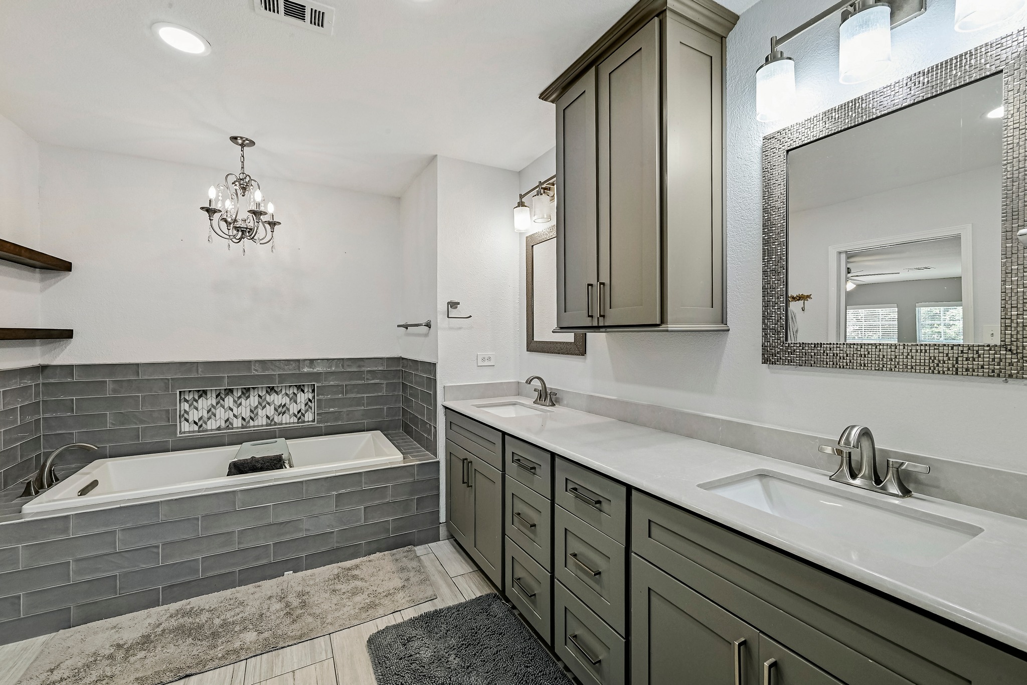 104 North Sumac Lane Georgetown, TX 78633 - Photo 31 of 40 Indulge in a primary bathroom featuring a spacious soaking tub and an extended double vanity for ultimate comfort.