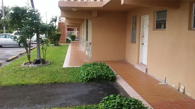 a view of a back yard of the house