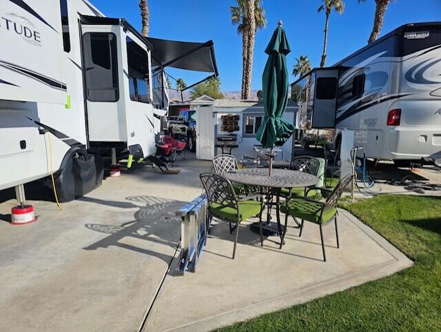 84136 Ave 44, Unit 573 Indio, CA 92203 - Photo 2 of 6 a view of outdoor space yard deck patio and fire pit