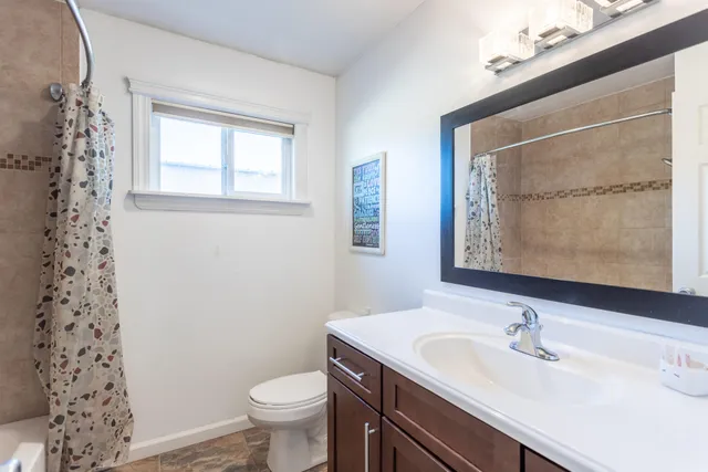 a house with trees in front of it