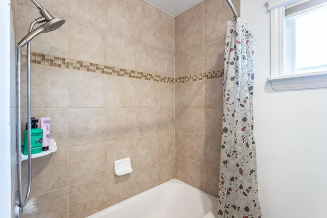 a view of a two chairs in the patio