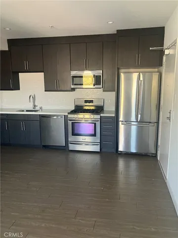 a bathroom with a shower and a toilet