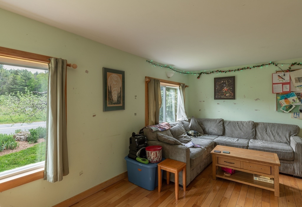 425 Dingle Road Worthington, MA 01098 - Photo 10 of 32 a living room with furniture and a window