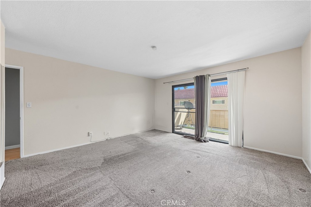 1000 Central Avenue, Unit 8 Riverside, CA 92507 - Photo 29 of 43 a view of an empty room with a window
