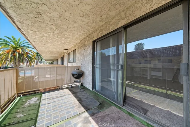 a bathroom with a shower and a sink