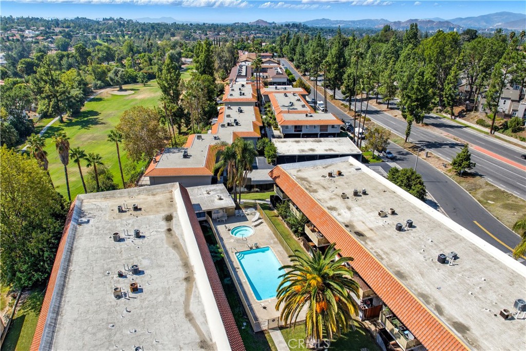 1000 Central Avenue, Unit 8 Riverside, CA 92507 - Photo 43 of 43 an aerial view of residential houses with outdoor space