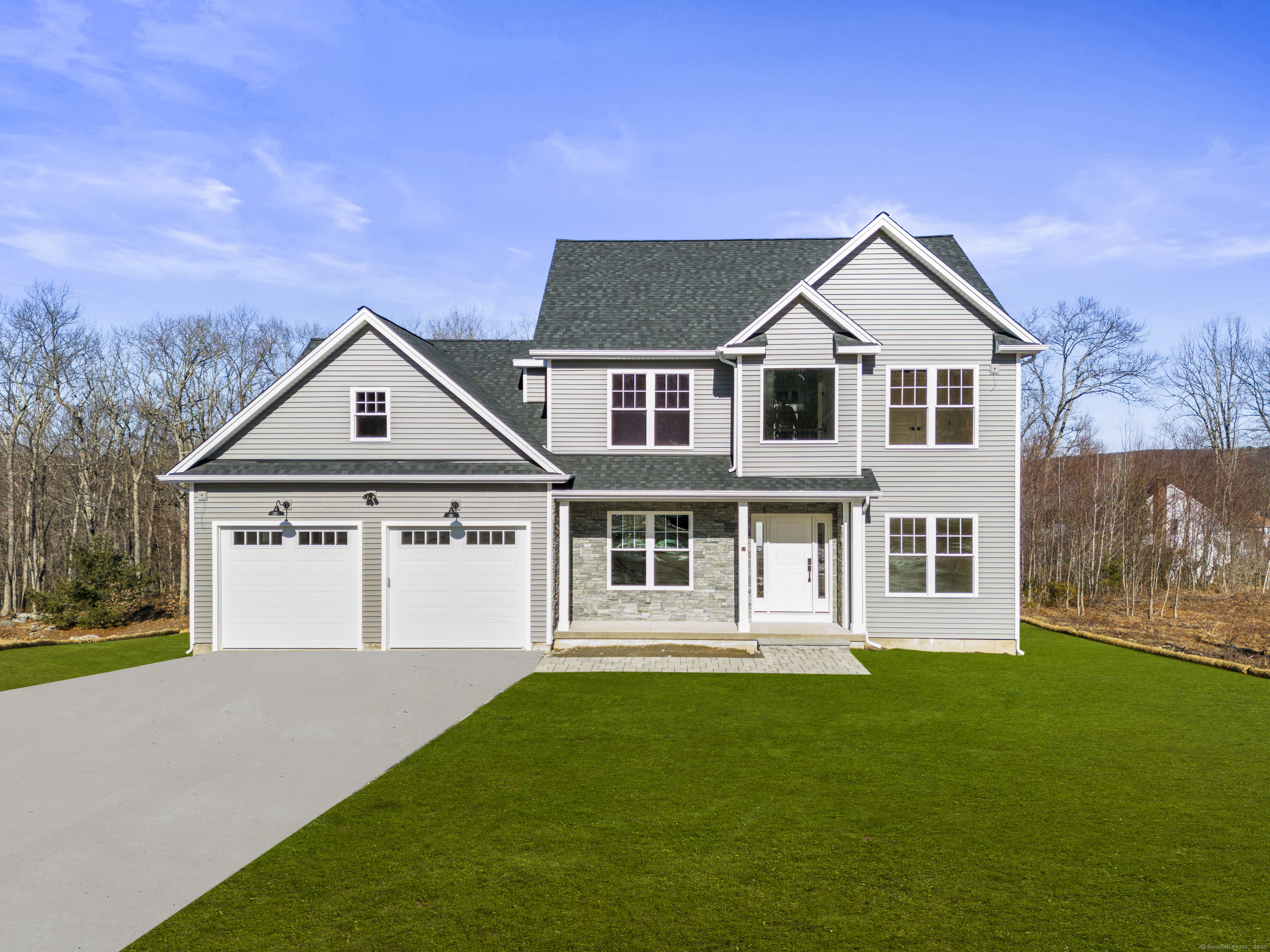 85 Rock Ridge Road Manchester, CT 06040 - Photo 7 of 27 a front view of a house with a yard