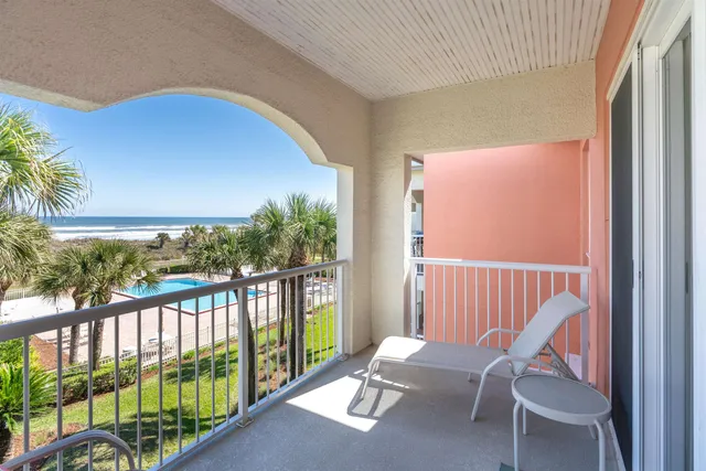a vase of flowers sitting on a table