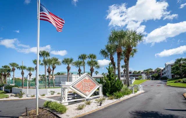 a view of a building with a yard