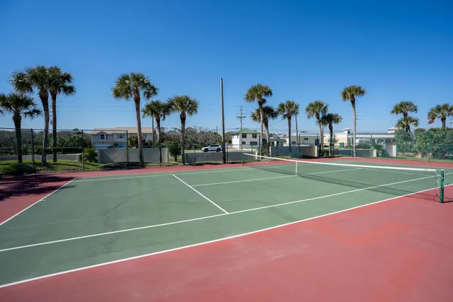 a view of a patio with swimming pool