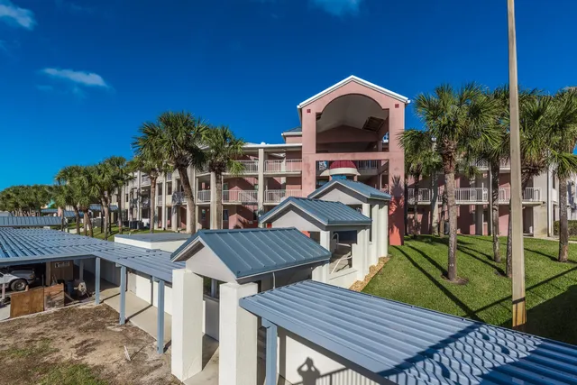a view of outdoor space with seating area and trees around