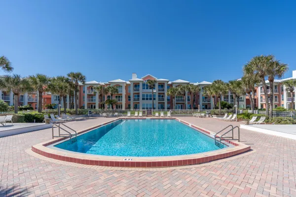 a view of hallway with bathroom
