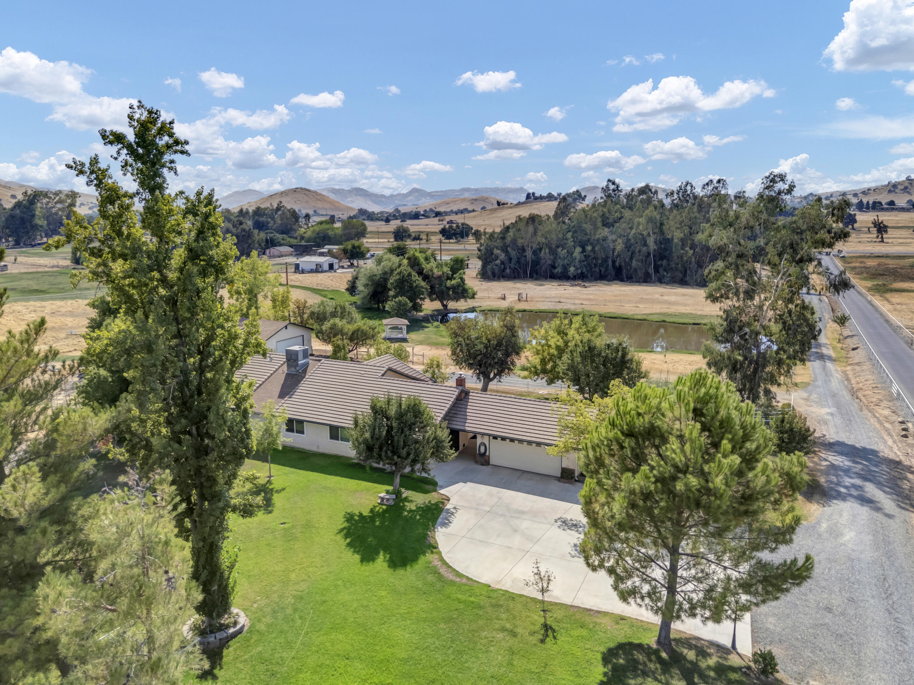 18002 320th Road Springville, CA 93265 - Photo 48 of 56 an aerial view of a house with garden space ocean and mountain view in back