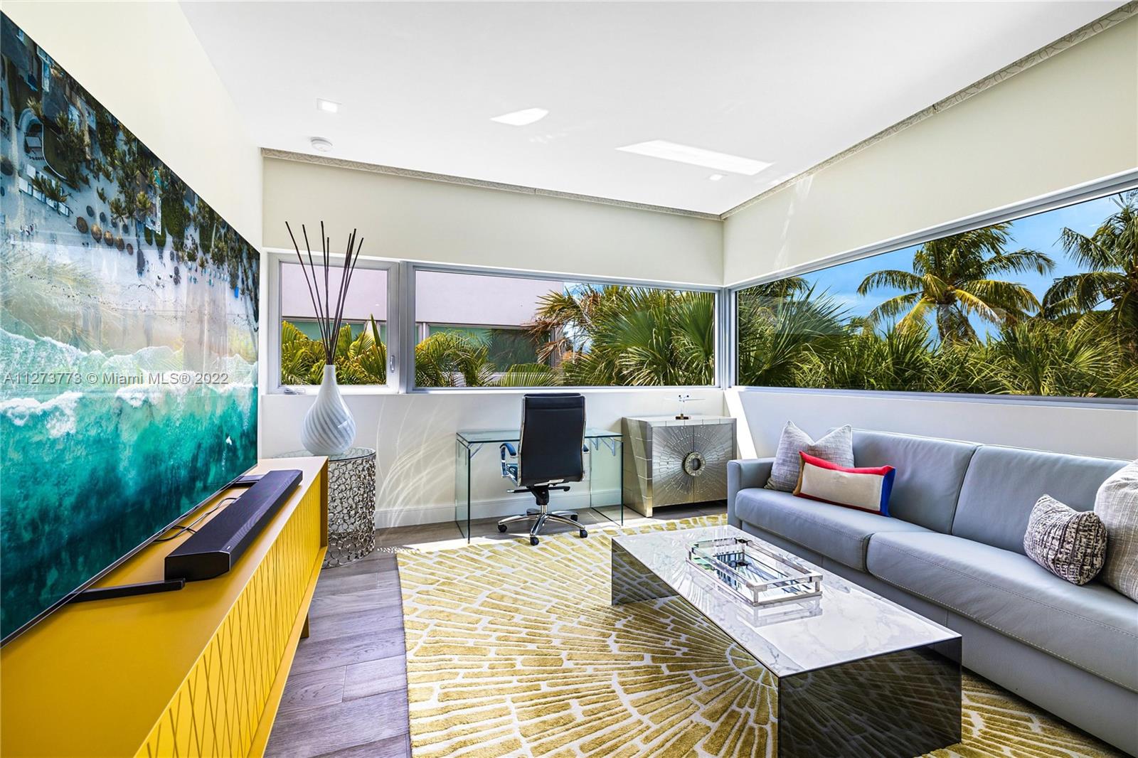 3000 Banyan Road, Unit B Boca Raton, FL 33432 - Photo 15 of 41 a living room with patio furniture and a wooden floor