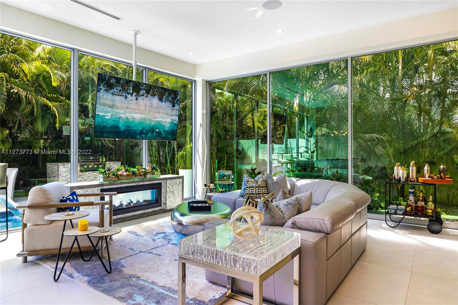 3000 Banyan Road, Unit B Boca Raton, FL 33432 - Photo 2 of 41 a living room with furniture and a large window