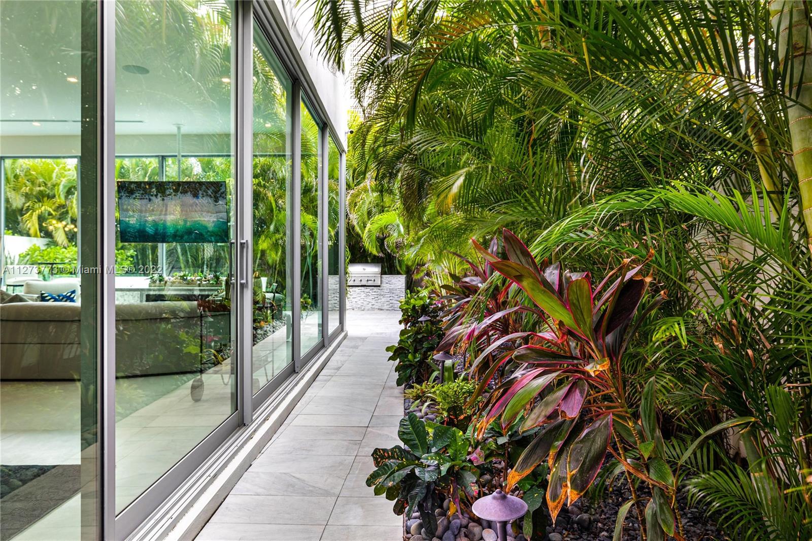 3000 Banyan Road, Unit B Boca Raton, FL 33432 - Photo 22 of 41 a view of a glass door