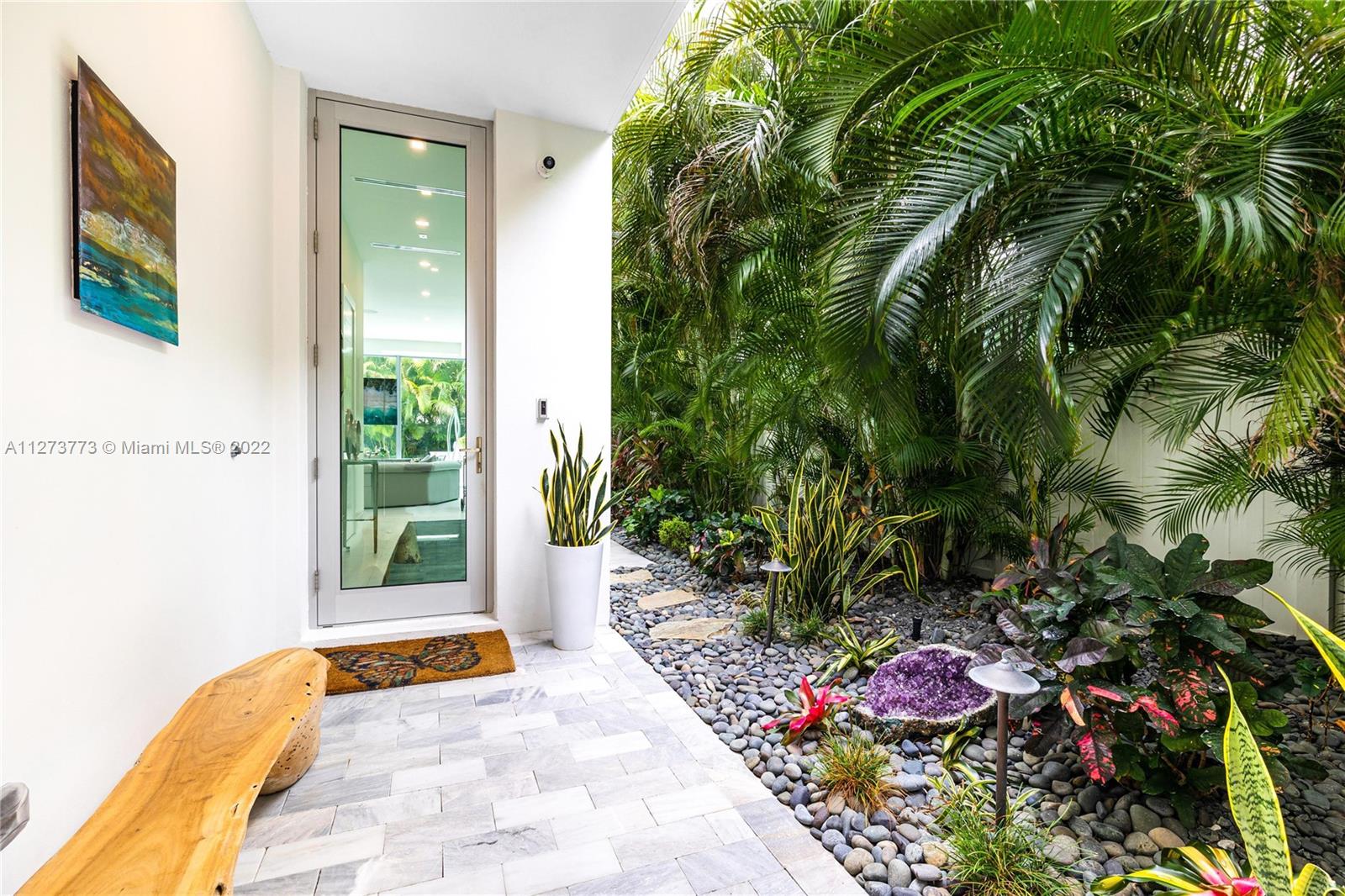 3000 Banyan Road, Unit B Boca Raton, FL 33432 - Photo 23 of 41 a backyard of a house with seating space