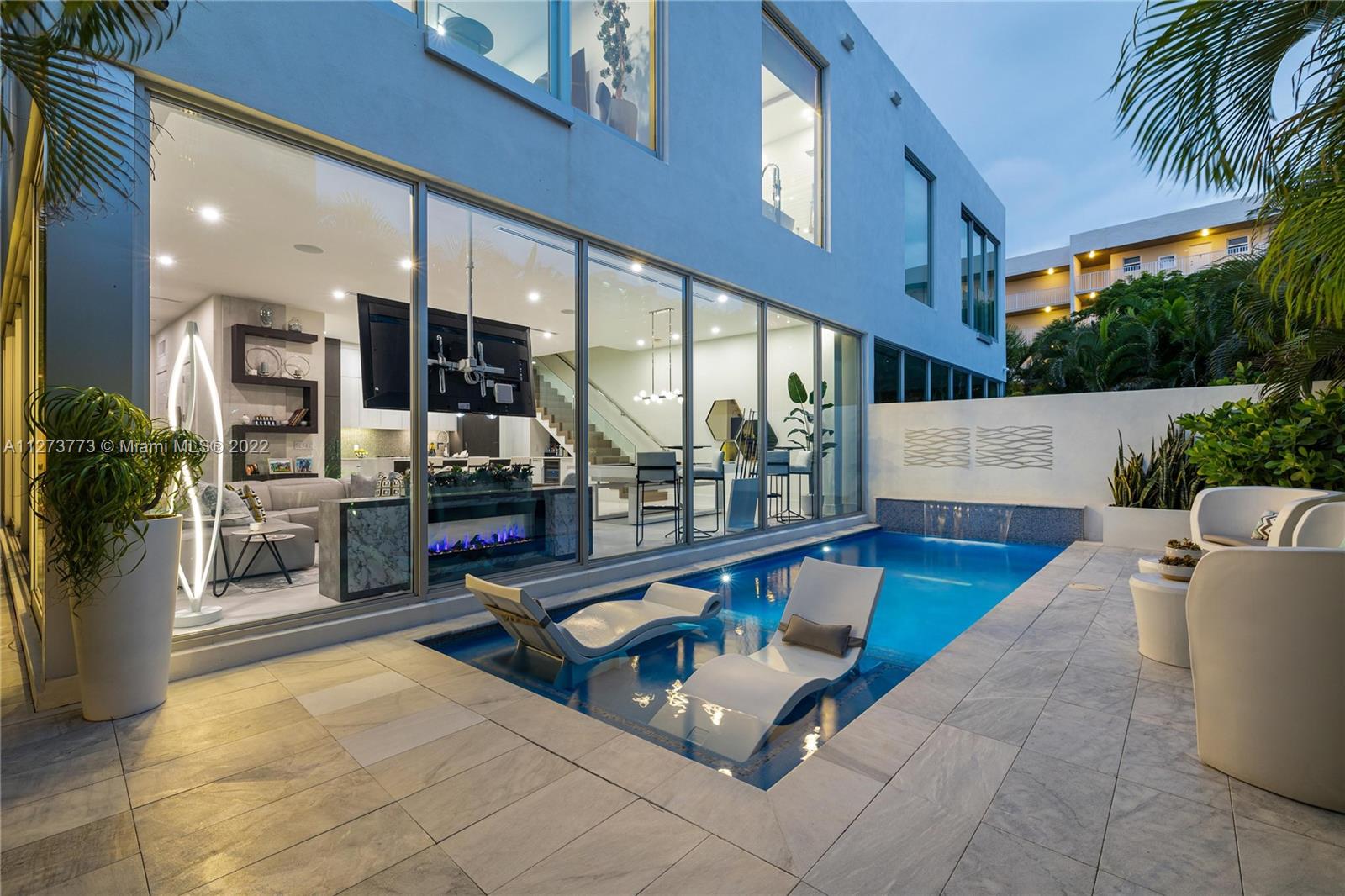 3000 Banyan Road, Unit B Boca Raton, FL 33432 - Photo 31 of 41 a view of swimming pool with seating area