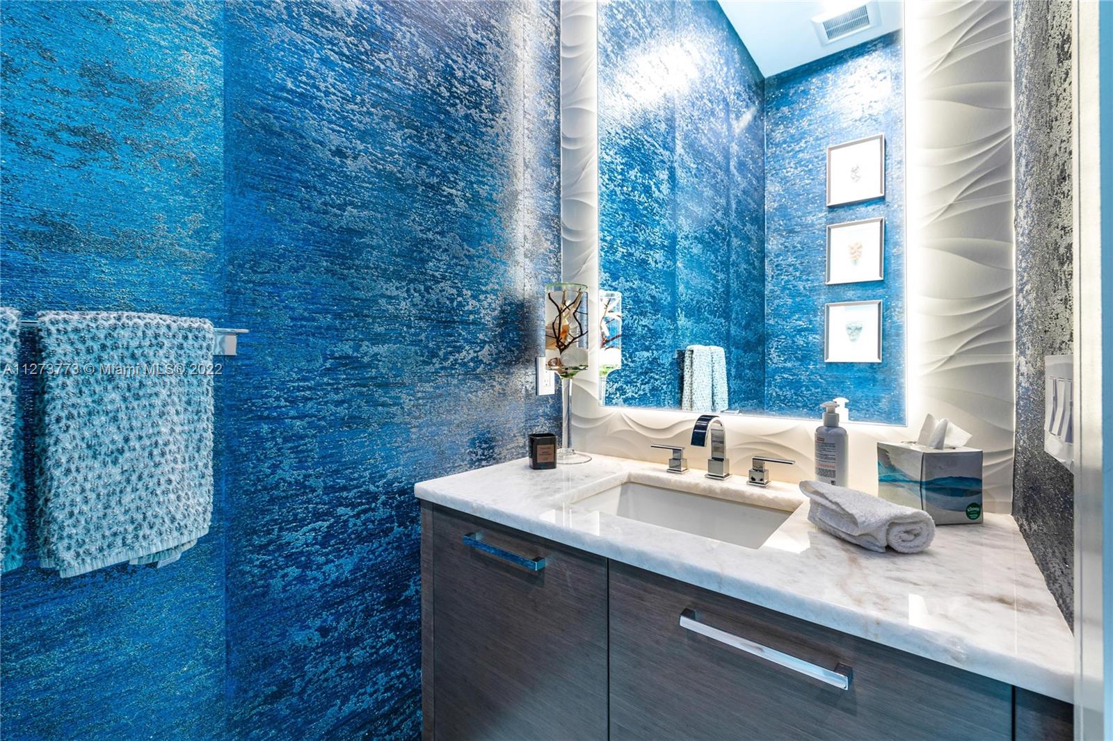 3000 Banyan Road, Unit B Boca Raton, FL 33432 - Photo 4 of 41 a bathroom with a sink and a mirror