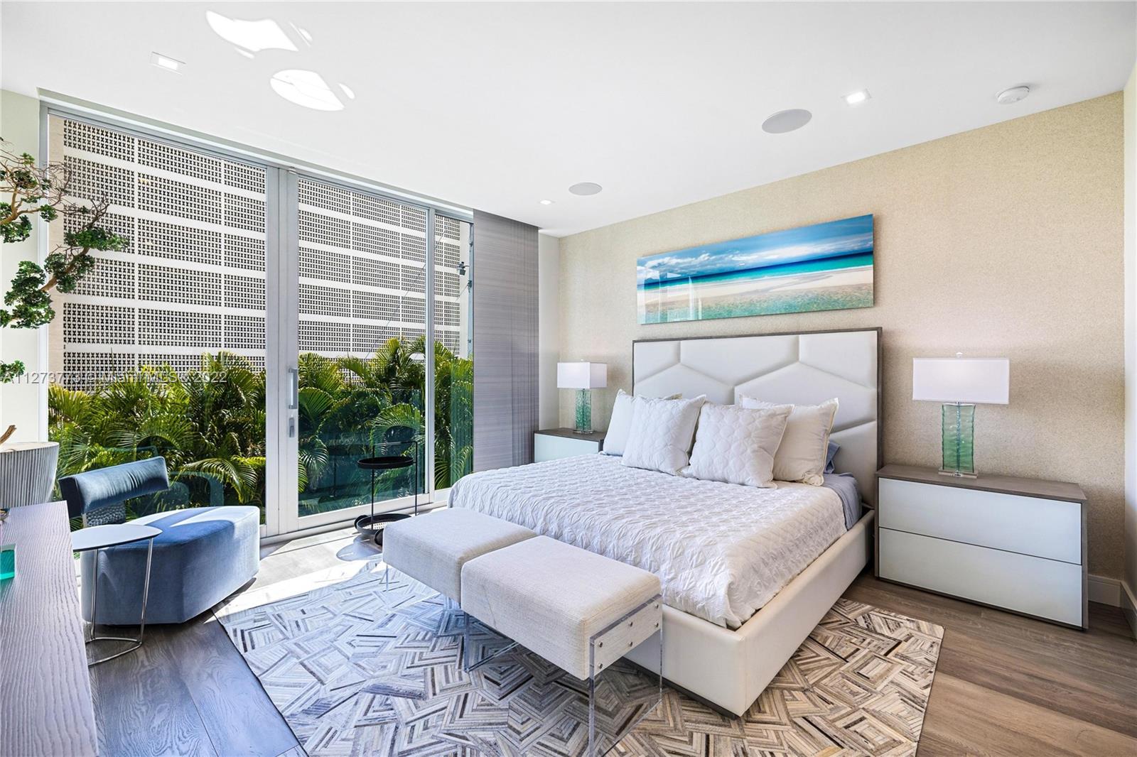 3000 Banyan Road, Unit B Boca Raton, FL 33432 - Photo 6 of 41 a bedroom with a bed and a large window