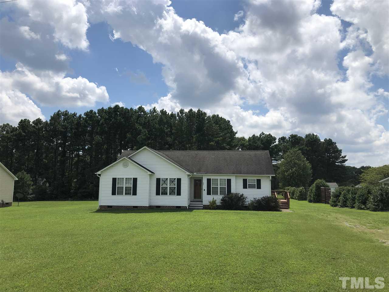 a view of a house with garden